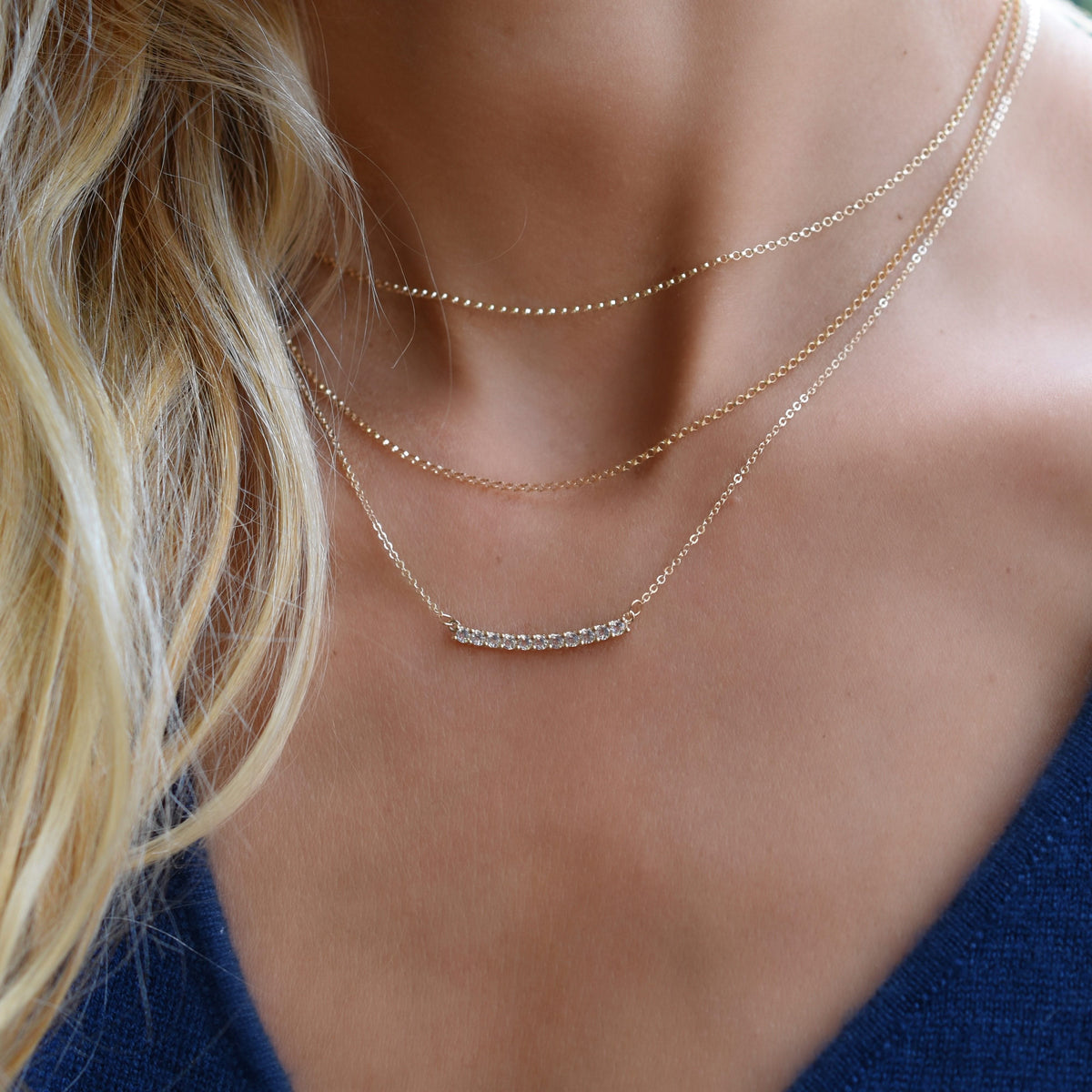 Rosecliff White Topaz Bar Necklace and Huggie Hoop Earrings Set in 14k Gold (April)