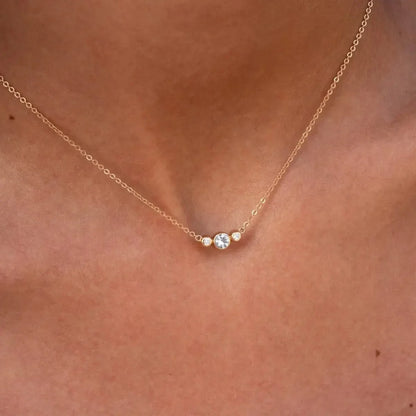 Barrington White Topaz Necklace with Diamond Side Stones (April)