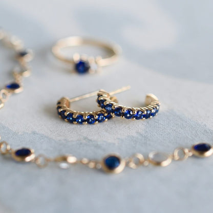Rosecliff Sapphire Huggie Hoop Earrings in 14k Gold (September)