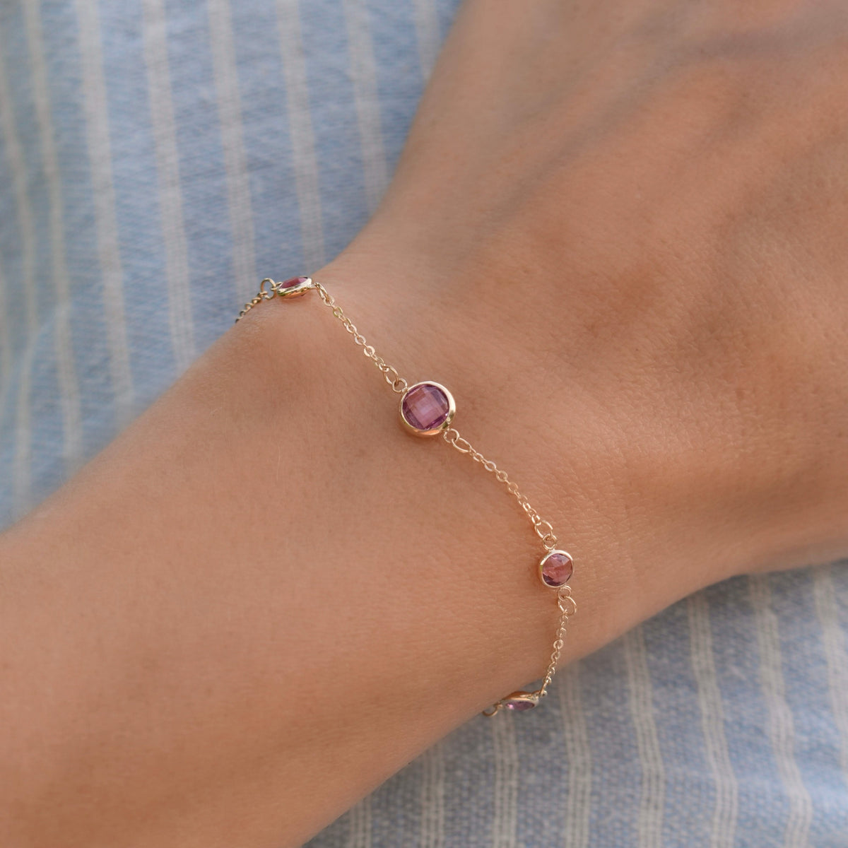 1 Grand & 4 Petite Pink Sapphire Bracelet in 14k Gold (October)