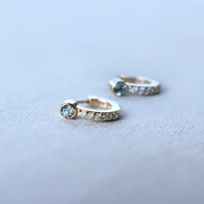Tiny Aquamarine Huggie Hoops with Diamonds in 14k Gold (March)