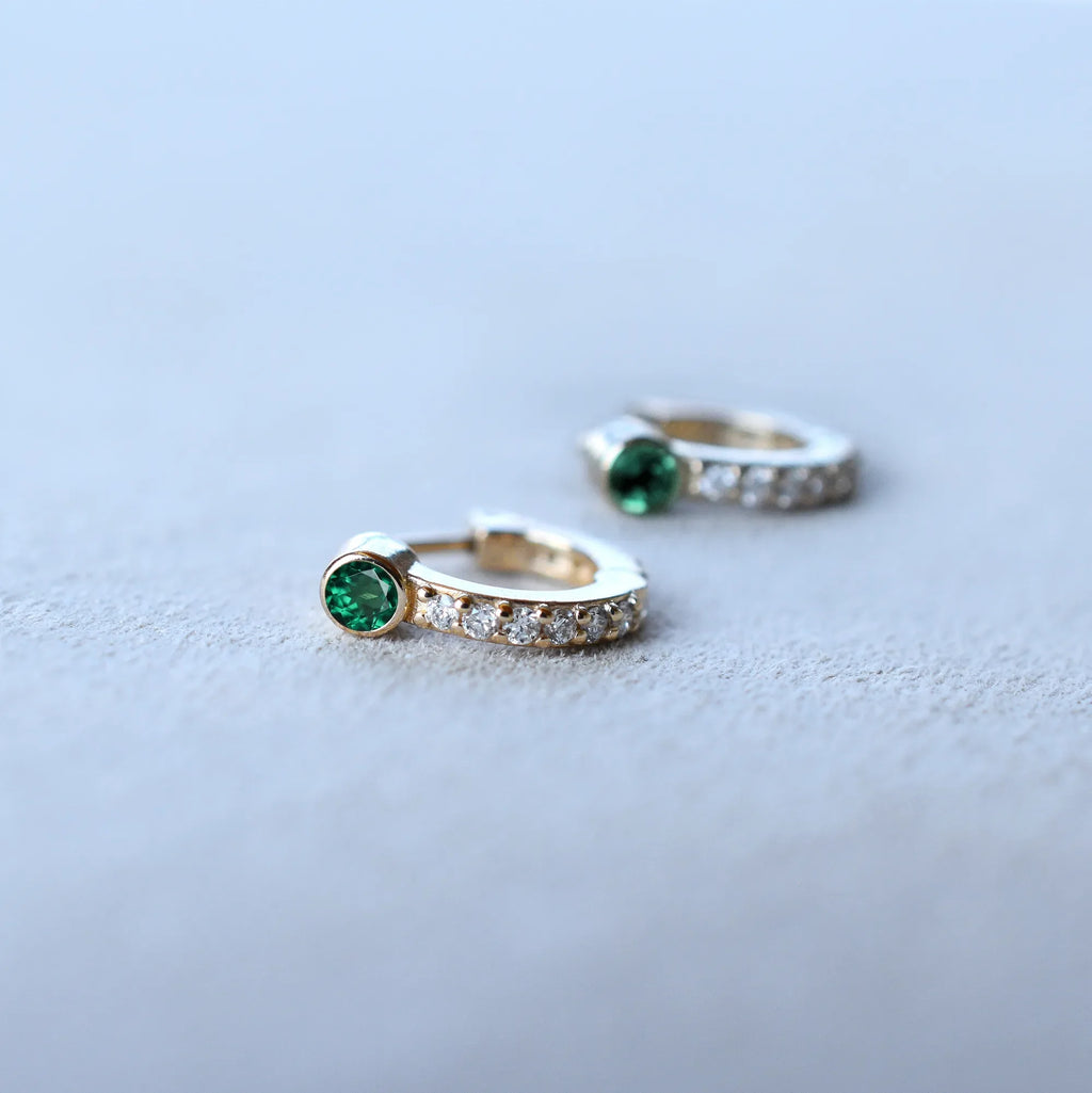 Tiny Emerald Huggie Hoops with Diamonds in 14k Gold (May)