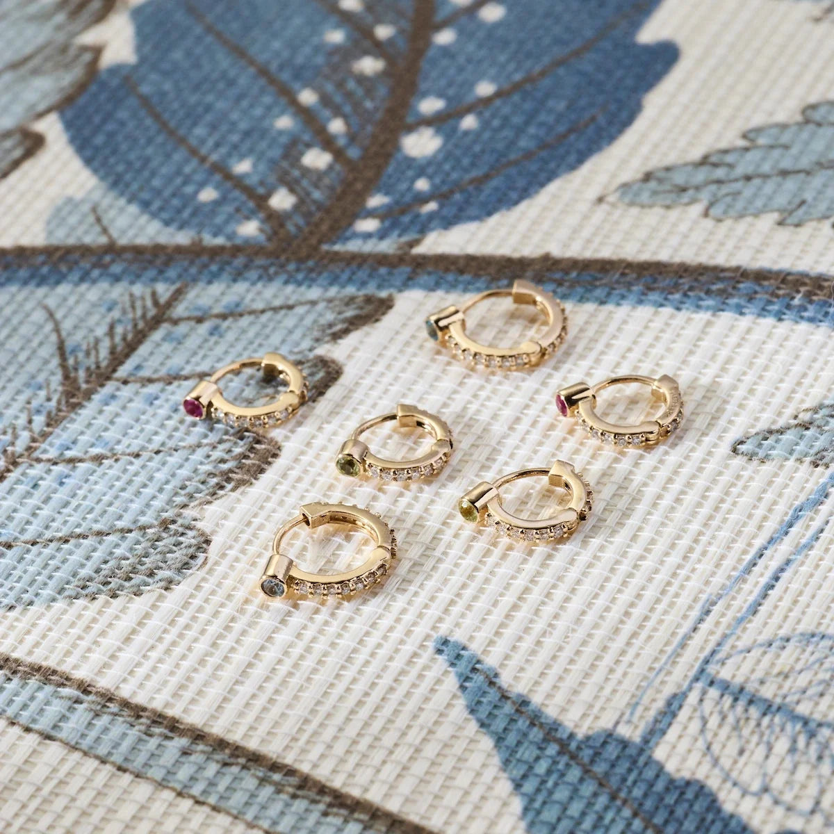 Tiny Peridot Huggie Hoops with Diamonds in 14k Gold (August)
