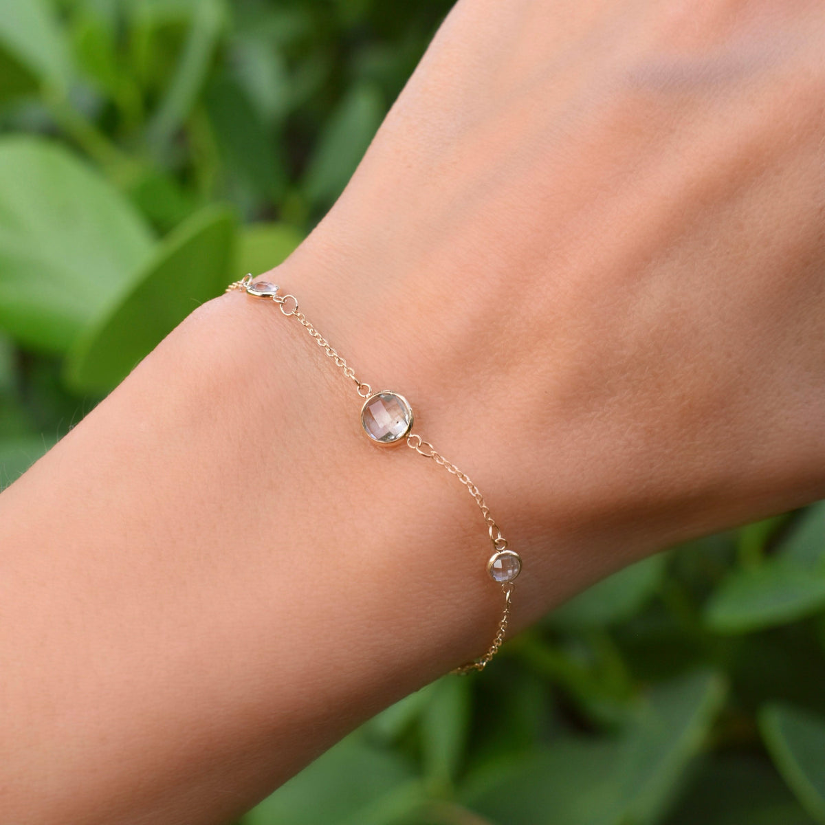 1 Grand & 4 Petite White Topaz Bracelet in 14k Gold (April)