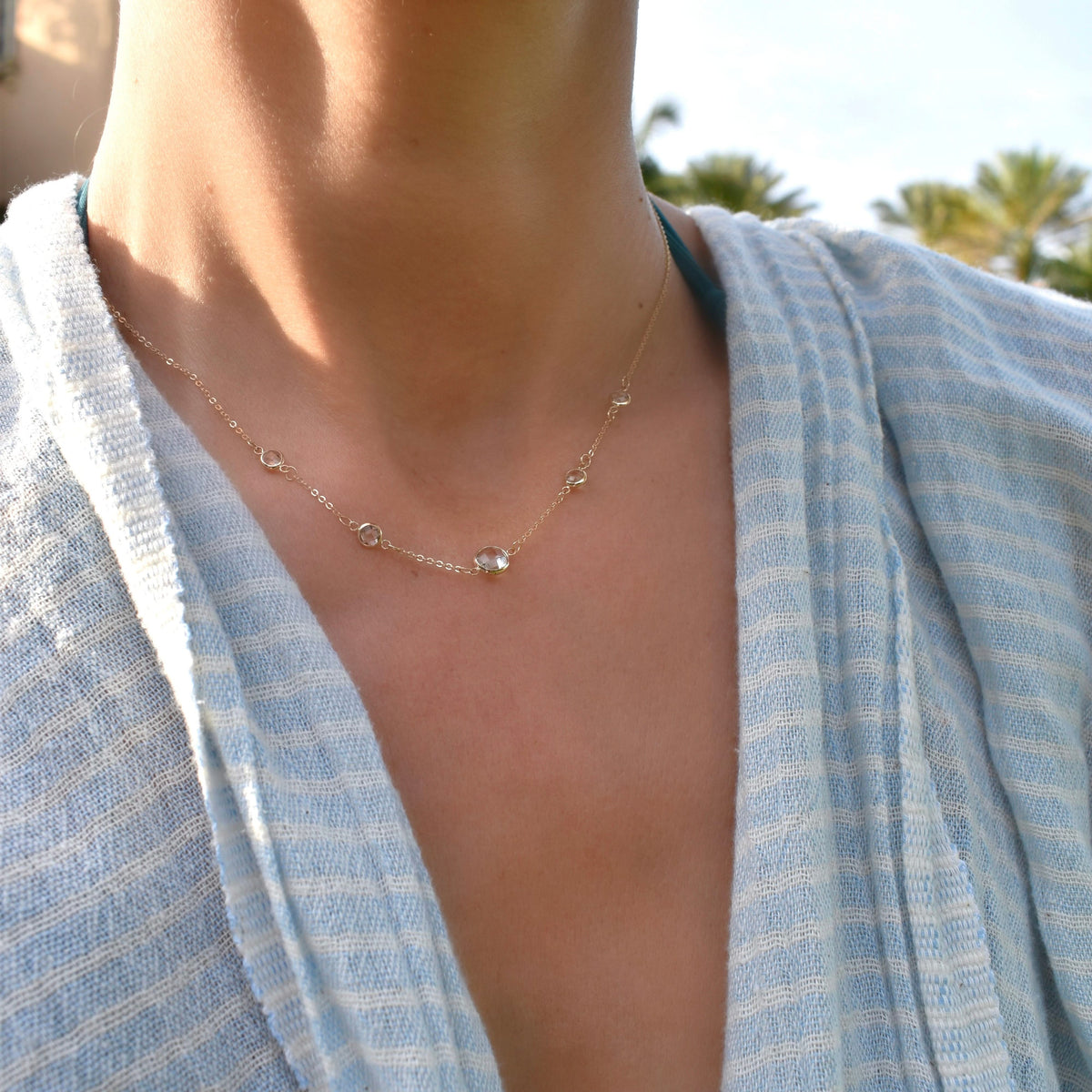 1 Grand & 4 Petite White Topaz Necklace in 14k Gold (April)