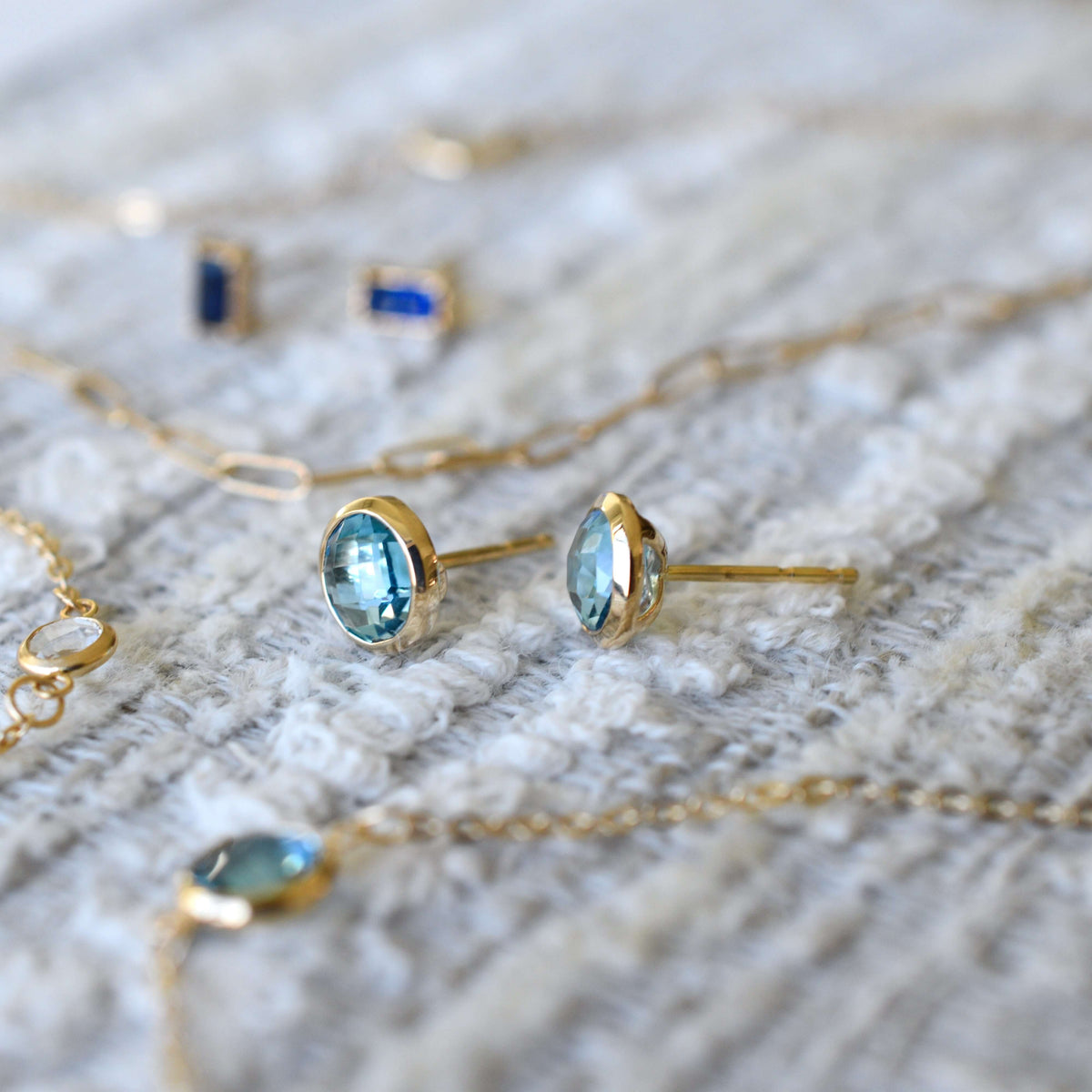Grand Nantucket Blue Topaz Stud Earrings in 14k Gold (December)