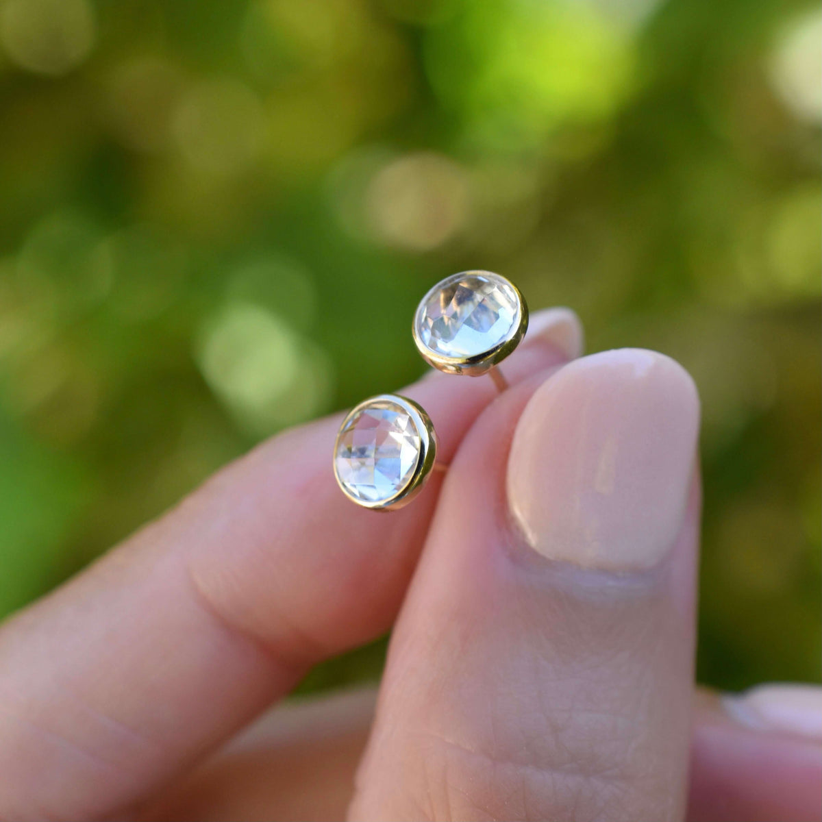 Grand White Topaz Stud Earrings in 14k Gold (April)