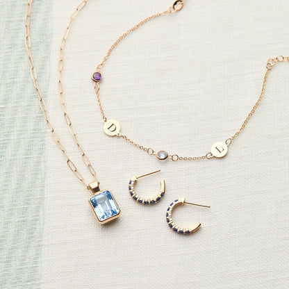 Rosecliff Sapphire Huggie Hoop Earrings in 14k Gold (September)