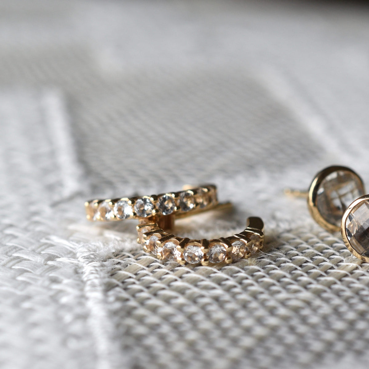 Rosecliff White Topaz Huggie Hoop Earrings in 14k Gold (April)
