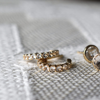 Rosecliff White Topaz Huggie Hoop Earrings in 14k Gold (April)